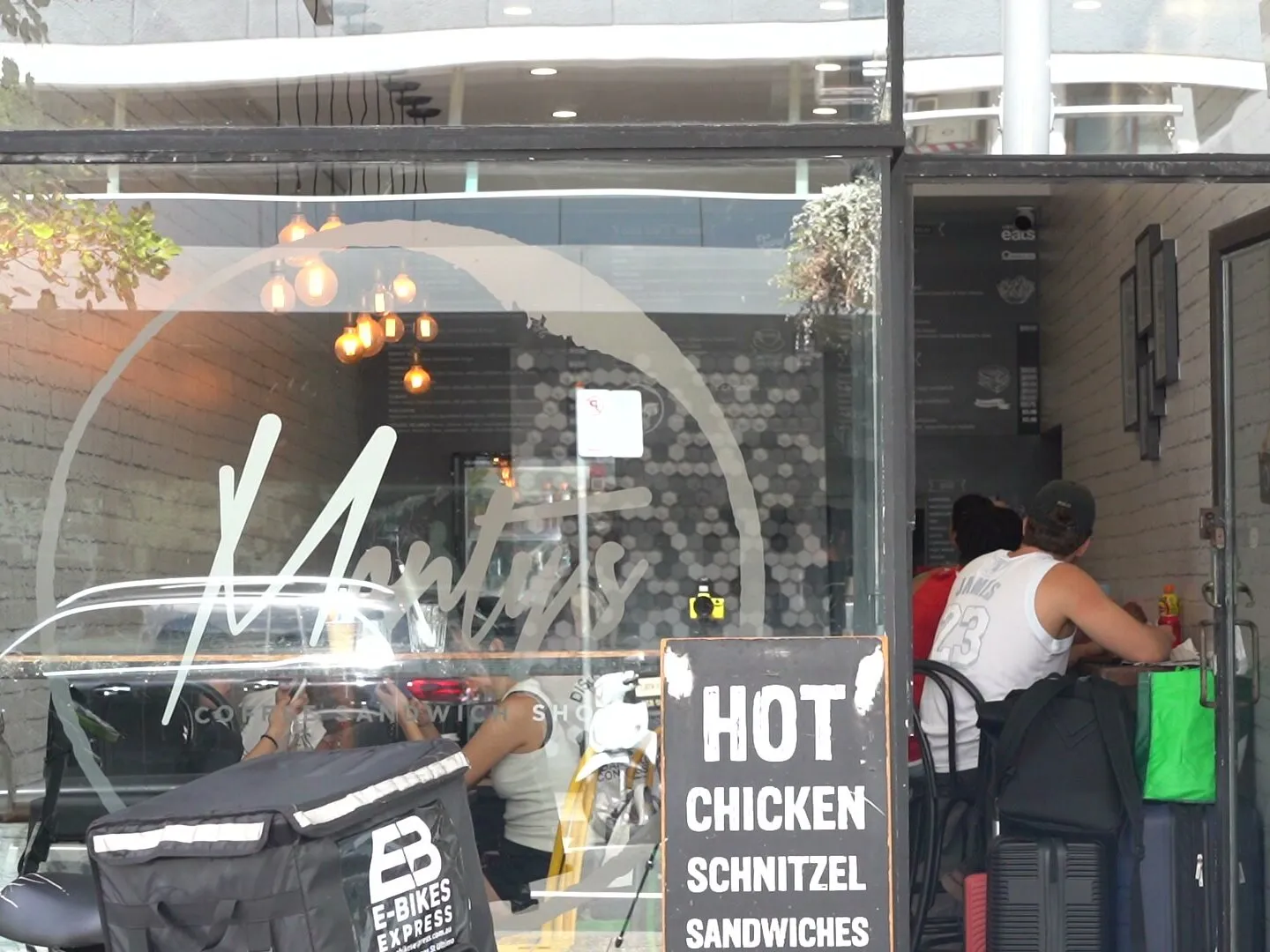 Monty's Sandwich Shop from Spring Street, Bondi Junction, with the logo on the window